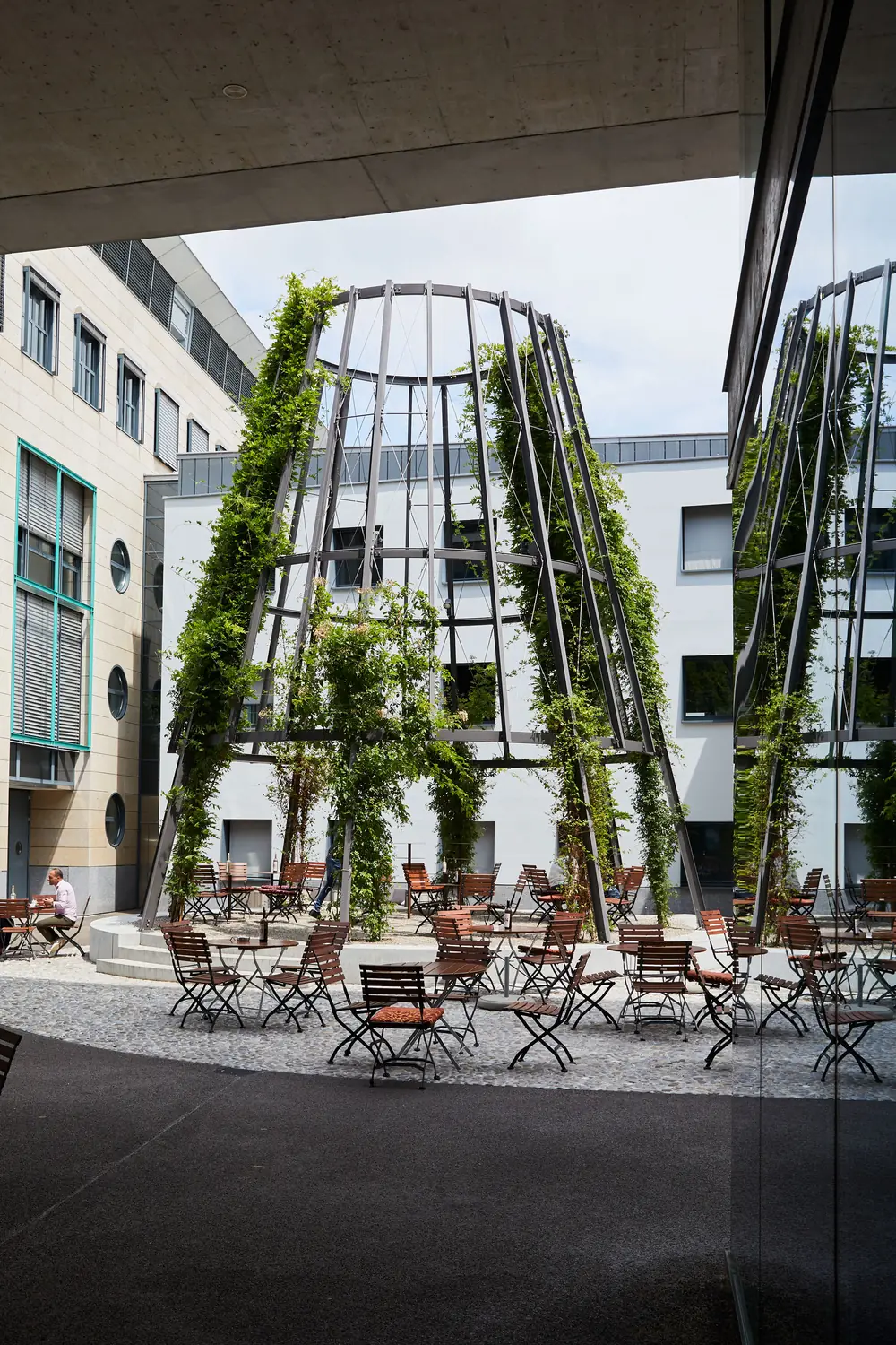 Green columns in a courtyard